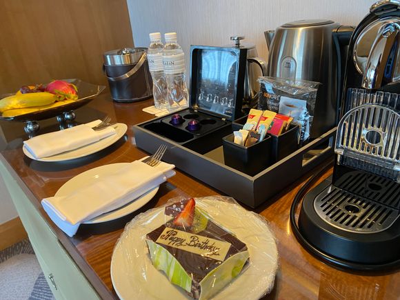 Westin room suite, birthday cake for me on coffee service area.