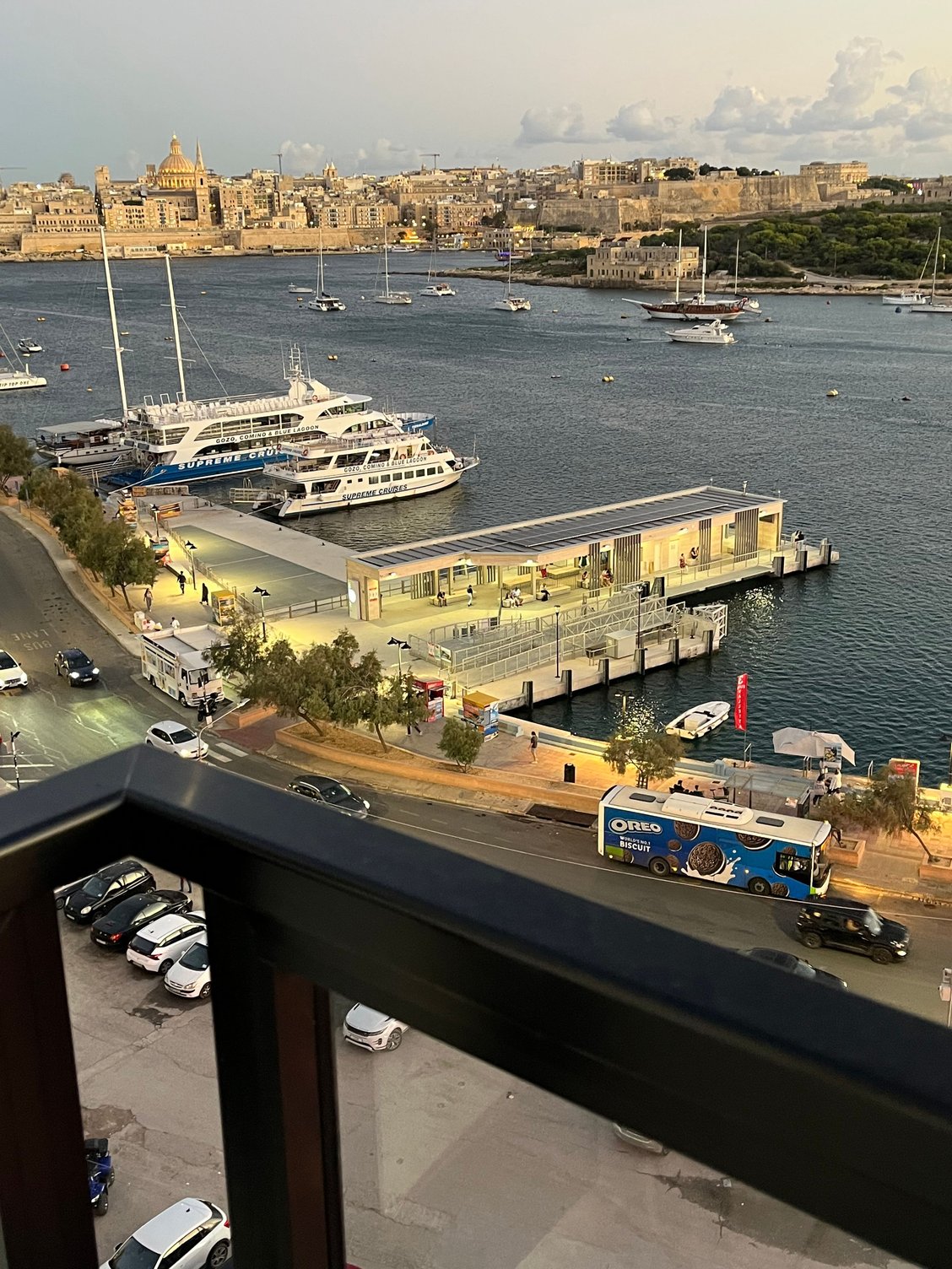 The long white building seen from our apartment is the Sliema ferry terminal where you board to go to Valletta.