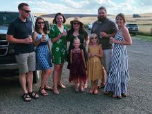A sample of Greencreek, Idaho wedding wear.  Two of my sisters, BIL, baby brother and his fiancé and two of my nieces.  We’re having Underwood canned wine that we brought to the reception. 