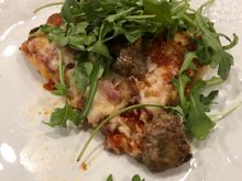 My slice of meatball pizza piled with arugula.  This was the best pizza I’ve ever made.  I shredded whole milk mozzarella and used a new type of parm.  I made the sauce my regular way with canned, fresh and sun dried tomatoes and fresh herbs, olive oil and a few other things thrown in. 