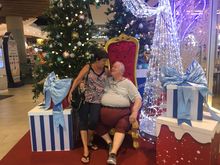 Bob playing Santa to Linda