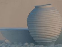 A white urn from the front of 