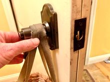Turning the interior (or exterior) door handle up or down gets the latch to behave 
