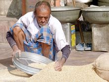I loved watching him work, sifting the grain. In Jaipur.