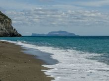 The view from Maronti beach to Capri. Just north is Barano/Buonopane, the rural locale where Stanley Tucci was once shown eating a rabbit dish in his Ischia episode. That restaurant was Il Focolare. A good overlook of Maronti can be had at Dionisio's 'Libeccio Cafe'. Cicero apparently used to visit the nearby 'Cava Scura' thermal springs at this very spot. 
