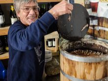 It also has an unusually high number of excellent restaurants for such a small place. Seen here is Gennaro, owner of the justly popular 'Aqua Pazza' restaurant. He had taken us next door to show his 'Colatura di alici' workshop. That was where he created his signature stinky fish sauce. 