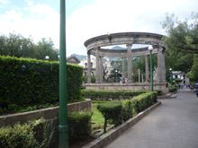 Looking south down the central Plaza (“Central America Park”).  Through the rotunda, towards the left, you can see the facade of the Holy Spirit (Espiritu Santo) cathedral, finished in 1540.  It’s not evident from here, but the facade is all that’s left of it. 
