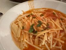 At the end of the brodetto, one eats the broken spaghetti with the tomato based sauce..divine!  (This photo should be after the following one)