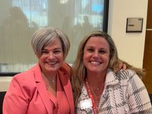 An advisee and me presenting at a wellness event 

