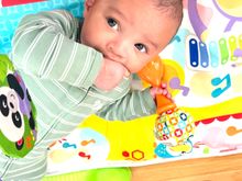 Kaleb has Leo to put his fingers in his mouth and tries to fit in a lot of them