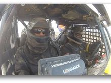 For offroad racing, fire suits also required as well as good roll cage. DS is co-driver on left reading gps because driver can't always see the trail.