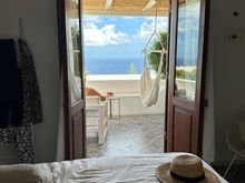 Our room, a superior double with terrace overlooking the sea.  Like all the rooms, it is on the small side with bed taking up most of the space.  But perfect for us!   A shady terrace overlooks the sea, and the islands of Stromboli and Panarea.  Terrace has one VERY comfy chair but that always seems to be occupied when I want to read there.  Also a hammock which I will try later.  Maybe.