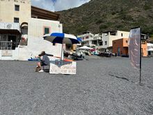 Entering the (entirely public) Rinella Beach, we encountered the option to rent comfy lounges (with shades that cover your head) and an umbrella--one for two loungers.  (20 euro for all,  in September)