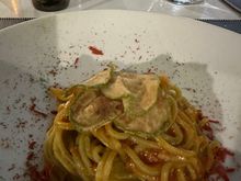 Simple ingredients together result in a smashing pasta dish:  Fresh tagliolini alle carretriera with fried zucchini in razor-thin slices, and a sublime sauce made from three (!!) types of Sicilian tomatoes:  Pacchino, datterino, and one more I did not catch.  Good restaurants will usually note the tomato variety on their menus.  We drove so many times through Pacchino last year, and during our first week spent near Marina di Ragusa.   Now I very much regret stopping for seeds and information!