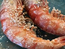 A pair of "alistado" prawns from Huelva, source of some of Europe's most adored shrimp.  Spanish restaurants usually leave the head on, for it contains much of the taste.  Wipes and water with lemon are offered to clean your fingers.  The meat of these was incredibly sweet.  No comparison to most shrimp I've tasted in the US, even in Louisiana.