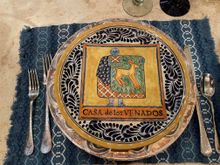 He had service for twelve around the dining room table