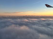 Soon after takeoff from Zurich; love seeing the Alps peeking above the clouds