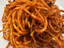 Here it is:  The legendary spaghetti all'assassinata..this is a HALF order and I could barely finish it,  after the antipasti