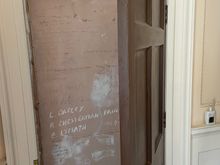 Everything has to be balanced in this architecture, even if it meant adding a door with nothing behind it.  It was needed to balance the door on the other side.