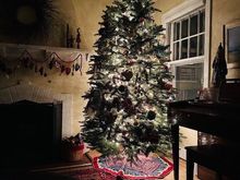 Finished tree. Nathan is always so patient about putting on a million lights. 