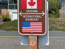 Canada is right across the street from this sign.  We were waving at people walking and driving by.  We could have walked right into Canada, but there was a Border Patrol directly in back of us in a Jeep looking at the boundry to make sure people didn't cross.