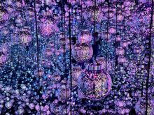 The "bubbles" will change color and pattern as you move your body and hands around them.