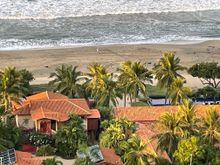 Looking straight down from the platform.  You can see a little figure in white on the beach
