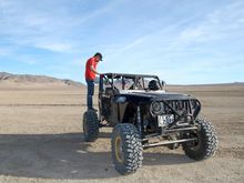 Johnson Valley, CA - if you're tall enough you might get some cell phone reception. Photo was taken by friends of DS to prove to his wife that he did try to call home while on guys' adventure trip.