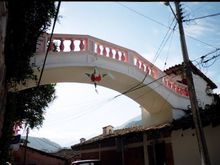 Liz Taylor Bridge In Puerto Vallarta , it is white now. It was constructed  during Richard Burton's filmed of "Night of the Iguana". Built by Richard Burton as a romantic gesture for Elizabeth. It is a replica of the Bridge of Sighs in Venice.