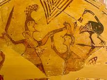 Scene from a Mycenean vase - possible Achilles battling the Amazon Queen Penthisilea.  This is much different iconography from what we see from the classical age!