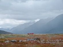 Tiny people dwarfed by Ainsworth Bay.
