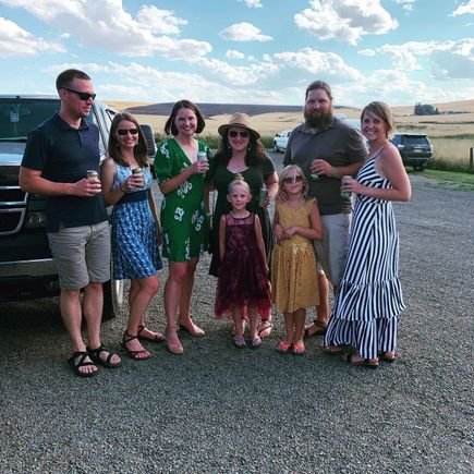 A sample of Greencreek, Idaho wedding wear.  Two of my sisters, BIL, baby brother and his fiancé and two of my nieces.  We’re having Underwood canned wine that we brought to the reception. 