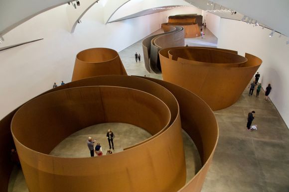 Sculpture inside by Richard Serra. You get incredibly disoriented walking around the circles which have hard to see angles due to the construction.
