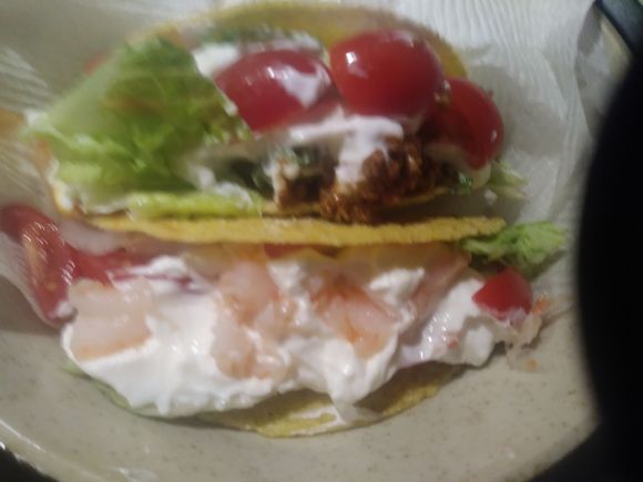 Shrimp taco and turkey taco  with whole milk yogurt and grape tomatoes and shredded lettuce. 