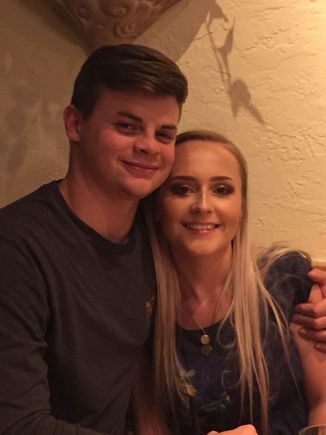 My granddaughter and fiancé. Not engagement picture, taken by me at Olive Garden a year ago