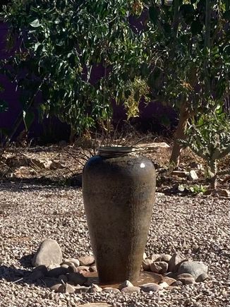 This is the bird bath created from a yard sale find. The birds like to sit and bathe in the bottom. It’s a very subtle sound.