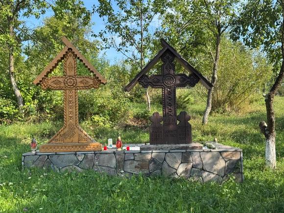 Note the wooden headstones