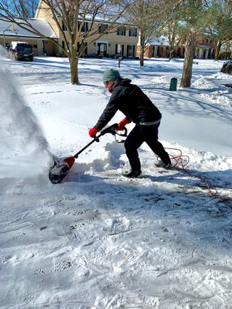 This Toro electric snow blower works great! It was fun getting dressed up in my Patagonia clothing again, although I would much prefer to be back down there. It is now up to 12°. Refreshing!