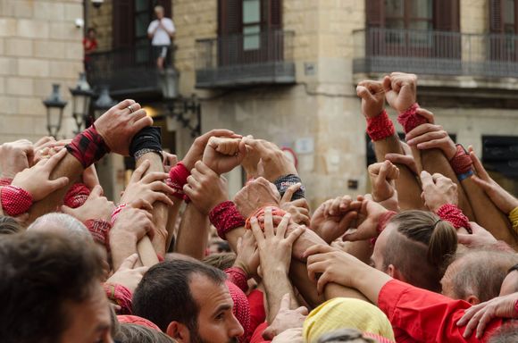 Here we go! Captains encouraged their teams with this ritual of grasping hands in a huddle.