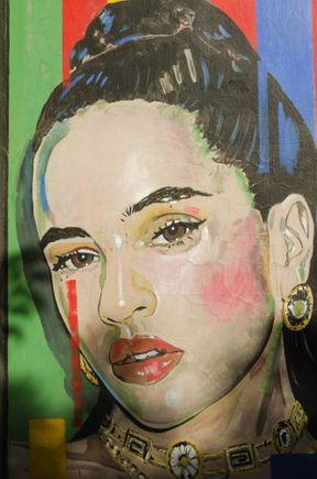 Some street art. Atop, we see a depiction of local popstar Rosalia in the placa Jaume Sabartes. A break-and-enter had just happened a block away as we snapped this shot, leaving smashed glass from an unfortunate small business' front window littering the alley.