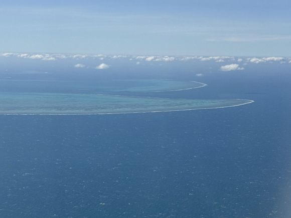 Caught a glimpse of the Barrier Reef landing in Cairns