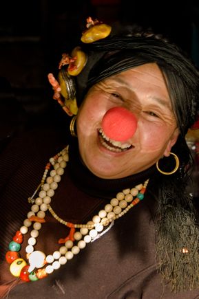 This Tibetan woman in Zhangzha raced over, then insisted that we take her picture with the nose prop, after seeing us do the same with children just outside her shop. 