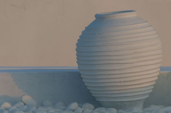 A white urn from the front of 
