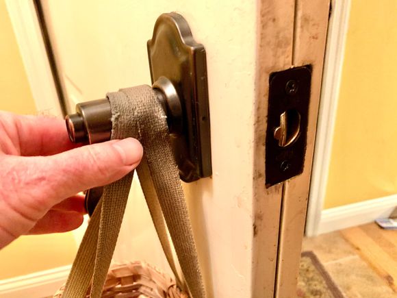 Turning the interior (or exterior) door handle up or down gets the latch to behave 