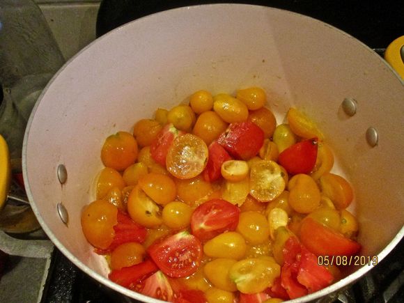 First tomatoes cooking down