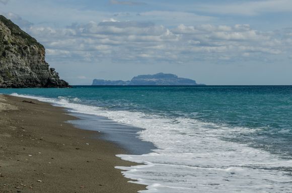 The view from Maronti beach to Capri. Just north is Barano/Buonopane, the rural locale where Stanley Tucci was once shown eating a rabbit dish in his Ischia episode. That restaurant was Il Focolare. A good overlook of Maronti can be had at Dionisio's 'Libeccio Cafe'. Cicero apparently used to visit the nearby 'Cava Scura' thermal springs at this very spot. 