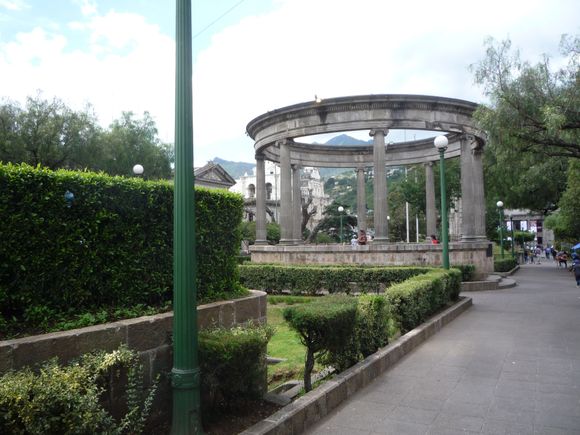 Looking south down the central Plaza (“Central America Park”).  Through the rotunda, towards the left, you can see the facade of the Holy Spirit (Espiritu Santo) cathedral, finished in 1540.  It’s not evident from here, but the facade is all that’s left of it. 