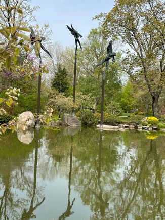 Not as great a picture but here’s my angel statues at Anderson Japanese Gardens, Rockford, Illinois.  There’s also a set of Millie’s angel statues in Philadelphia on the river banks. We had a bus load of Swedish tourists come to our Gardens primarily to see these statues. 