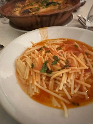 At the end of the brodetto, one eats the broken spaghetti with the tomato based sauce..divine!  (This photo should be after the following one)