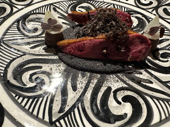 ROAST PIGEON with tomato, onion, garlic sauce aside a pate of pigeon:

PICHÓN ASADO y reposado con TOMATES tatemados, untuoso de CEBOLLA y paté
